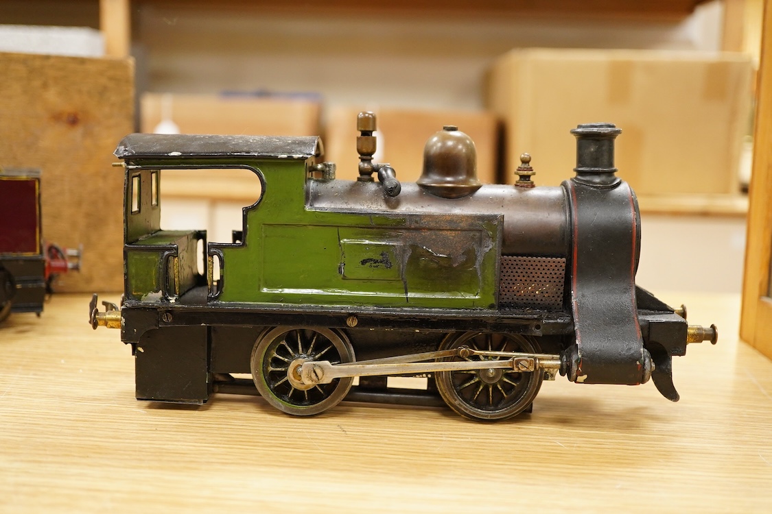 An early 20th century Gauge One Bing live steam 0-4-0T ‘I48’ locomotive, with a spirit fired pot boiler, driving a single oscillating vertical cylinder mounted in the cab, with twin outside dummy cylinders, the regulator